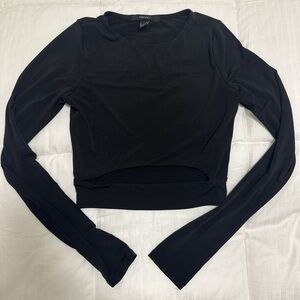 Forever 21 black long sleeve crop top with small cutout in the front